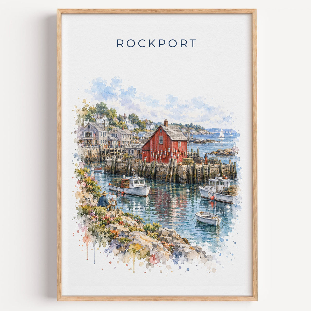 Rockport, Massachusetts watercolor print in a light oak frame on a plain white wall