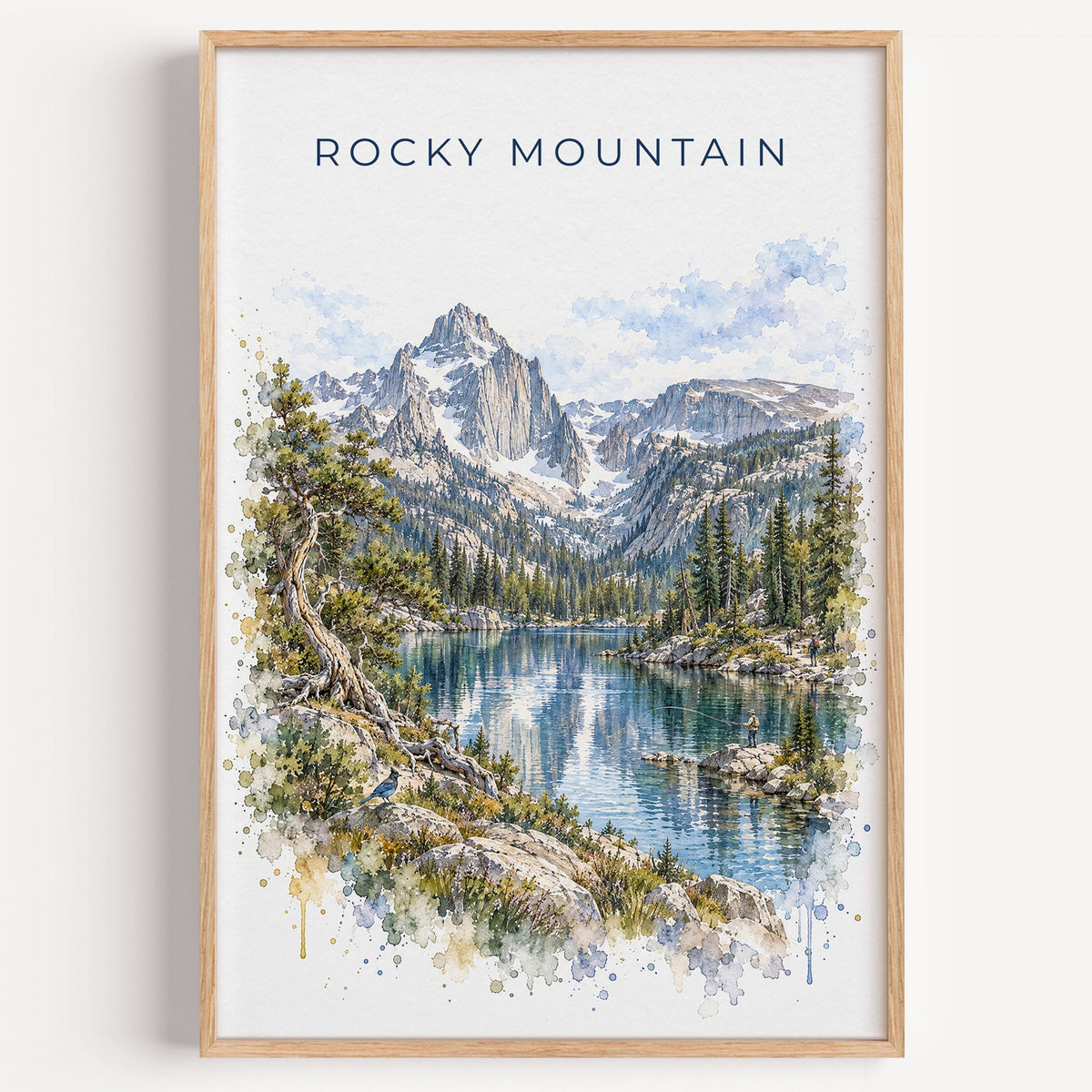 Rocky Mountain National Park watercolor print in a light oak frame on a plain white wall