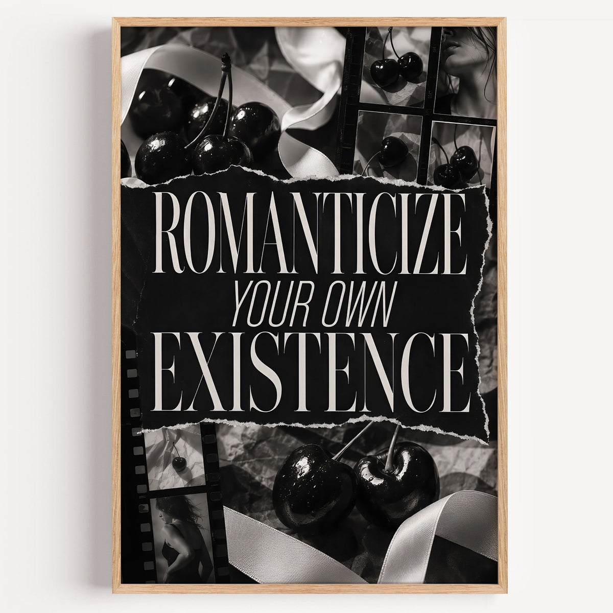 Romanticize your own existence cherry collage print in a light oak frame on a plain white wall