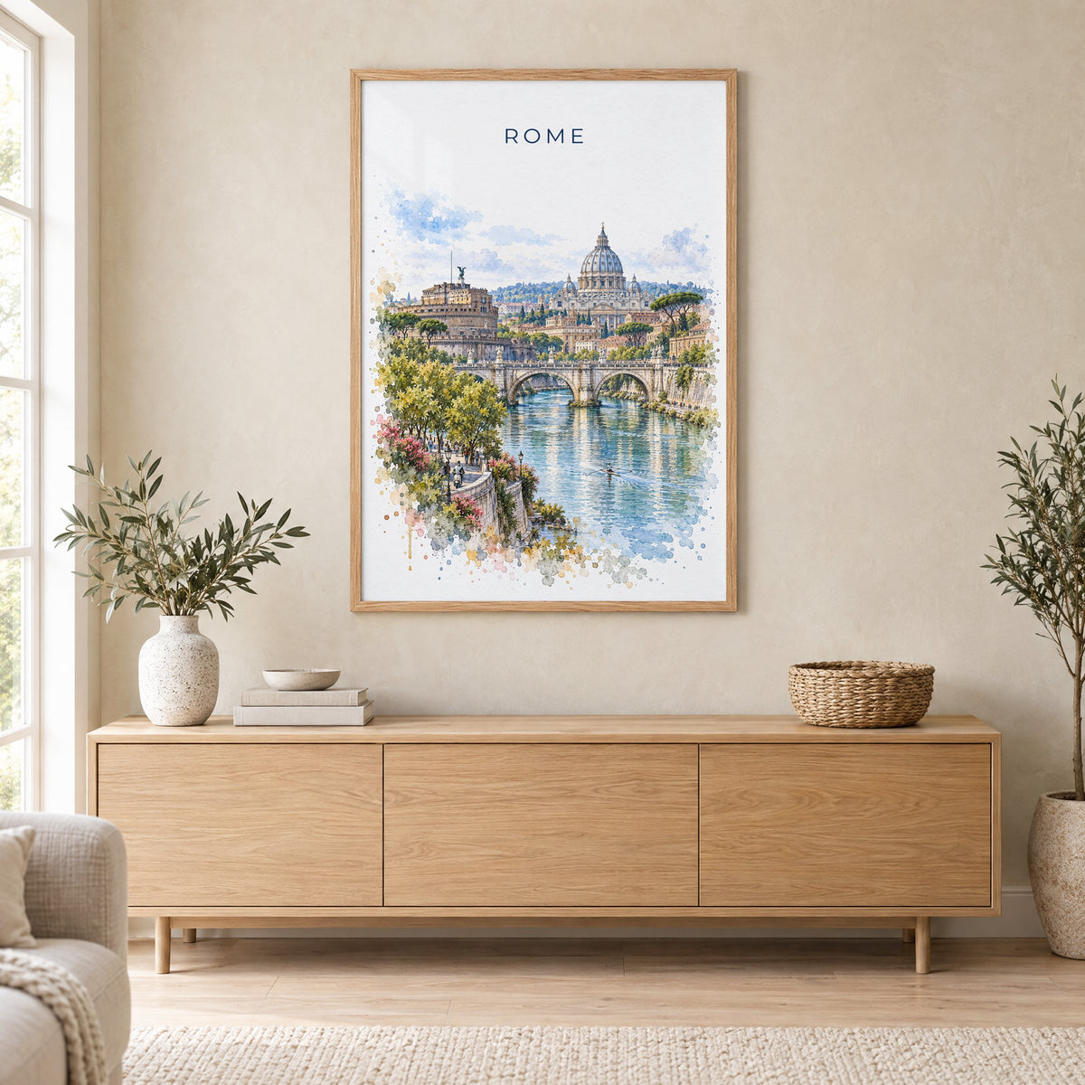 Rome watercolor print in an oak frame above a light wood sideboard in a Scandinavian living room