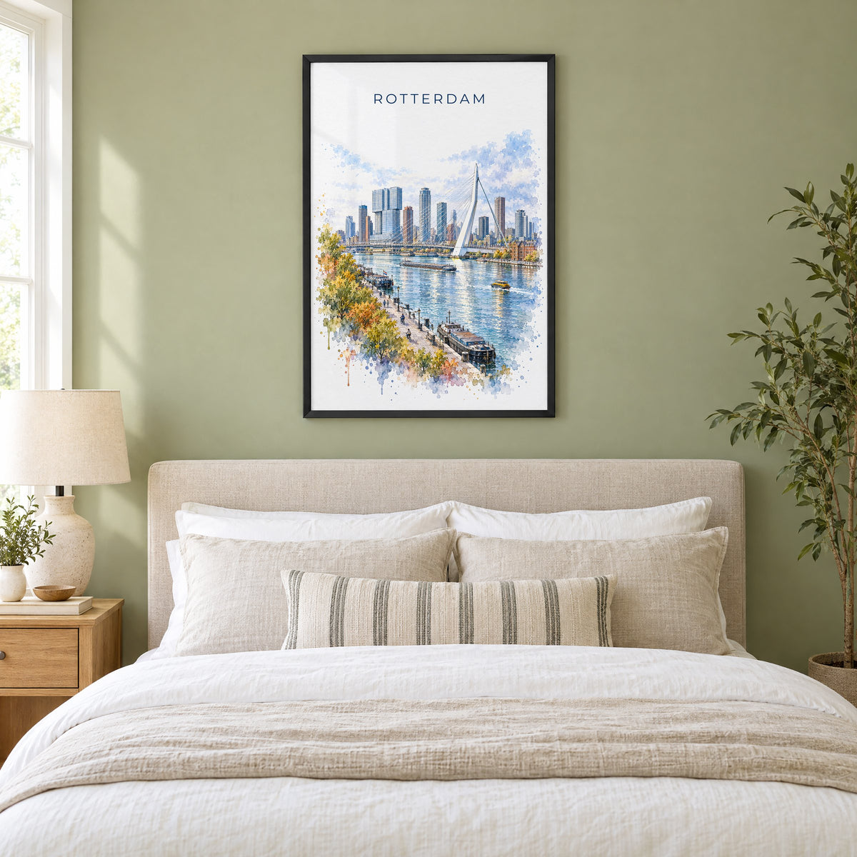 Rotterdam watercolor print in a black frame above an upholstered headboard in a sage green bedroom