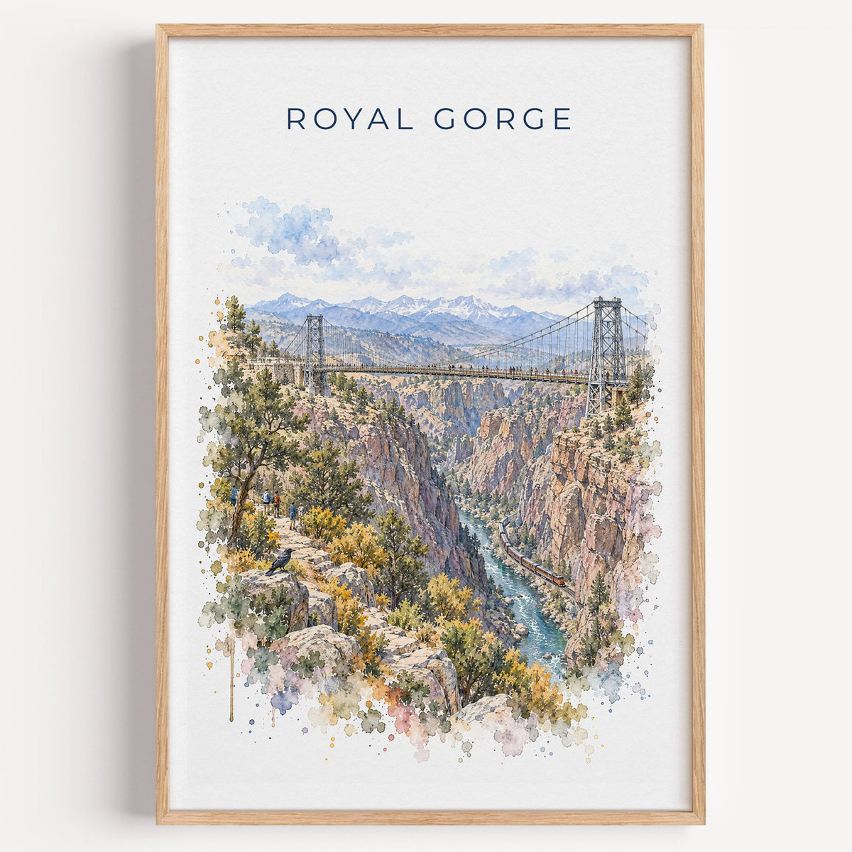 Royal Gorge watercolor print in a light oak frame on a plain white wall