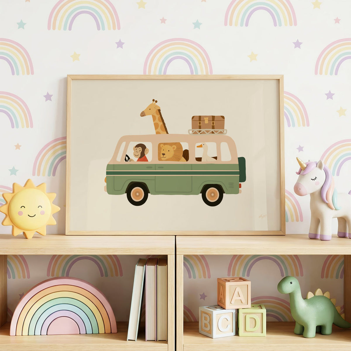Safari animals riding green van nursery print in an oak frame on a toy shelf against rainbow wallpaper