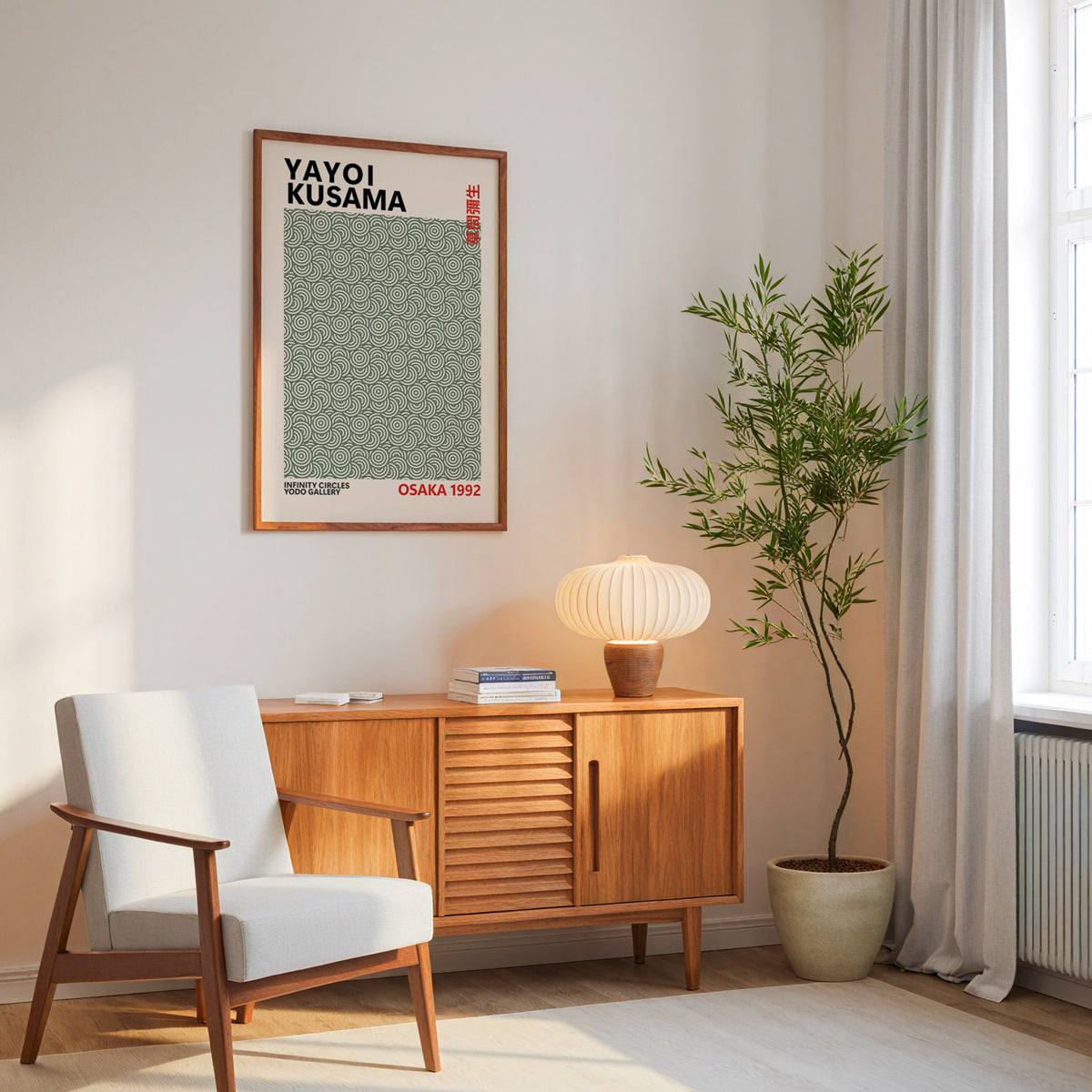 Yayoi Kusama inspired sage green circle pattern print above a mid-century sideboard