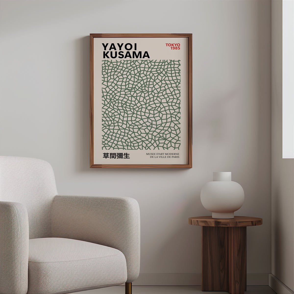 Yayoi Kusama inspired sage green net print above a cream boucle armchair