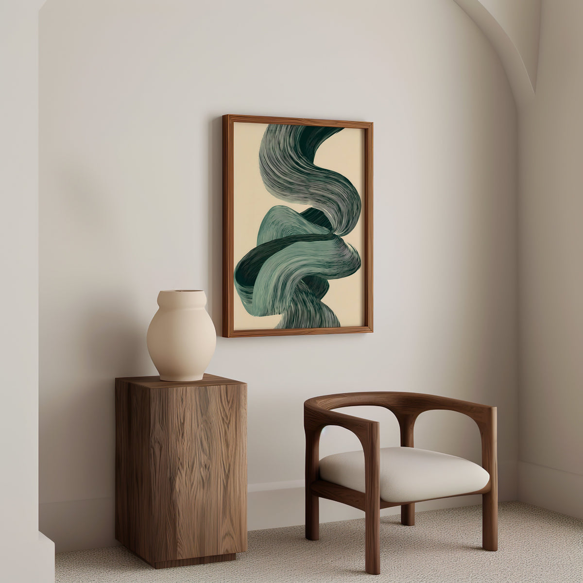 Sage green line ribbon swirl abstract print in a walnut frame above a wood pedestal and a curved walnut armchair