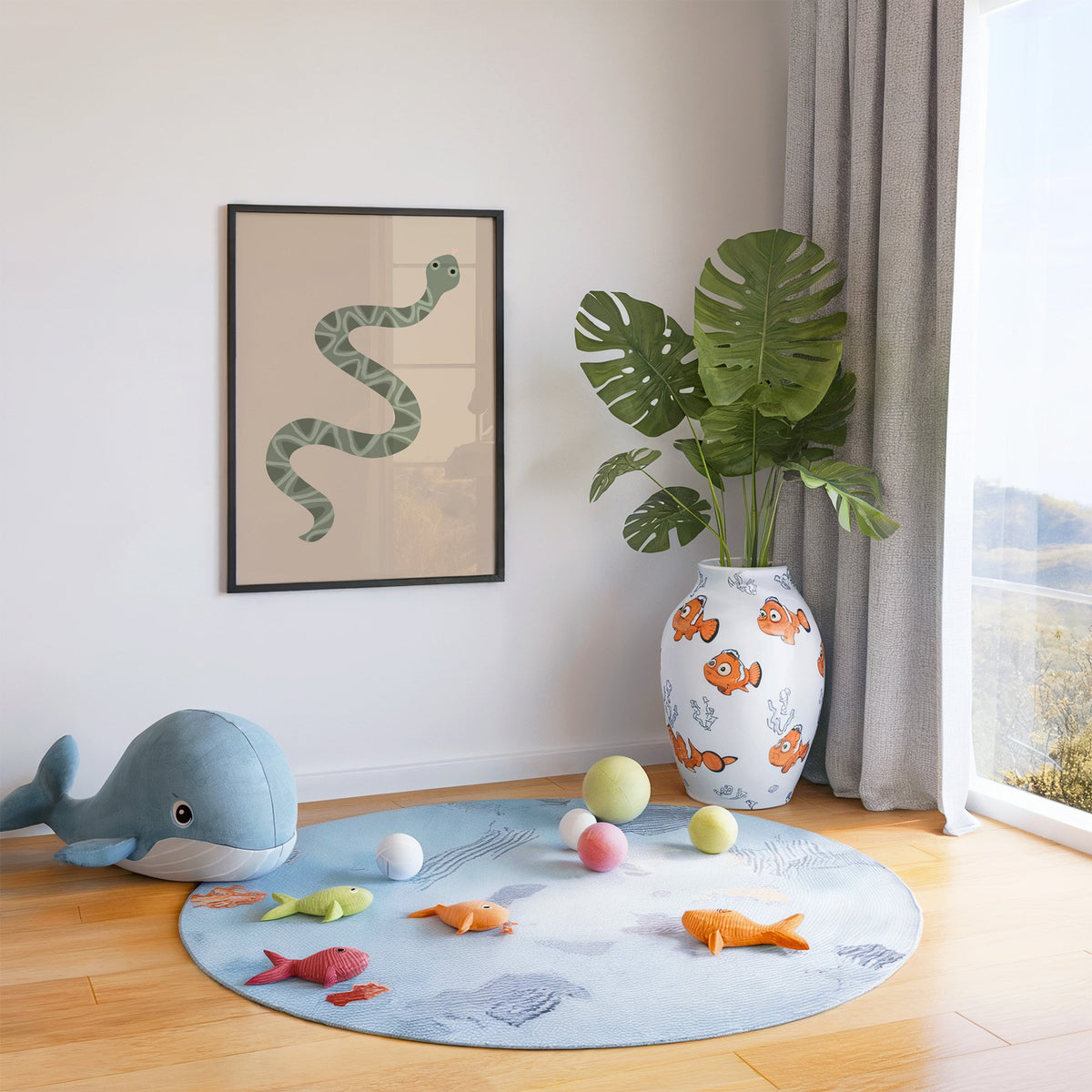 Sage green snake nursery print in a black frame in a playroom with an ocean rug and whale plush