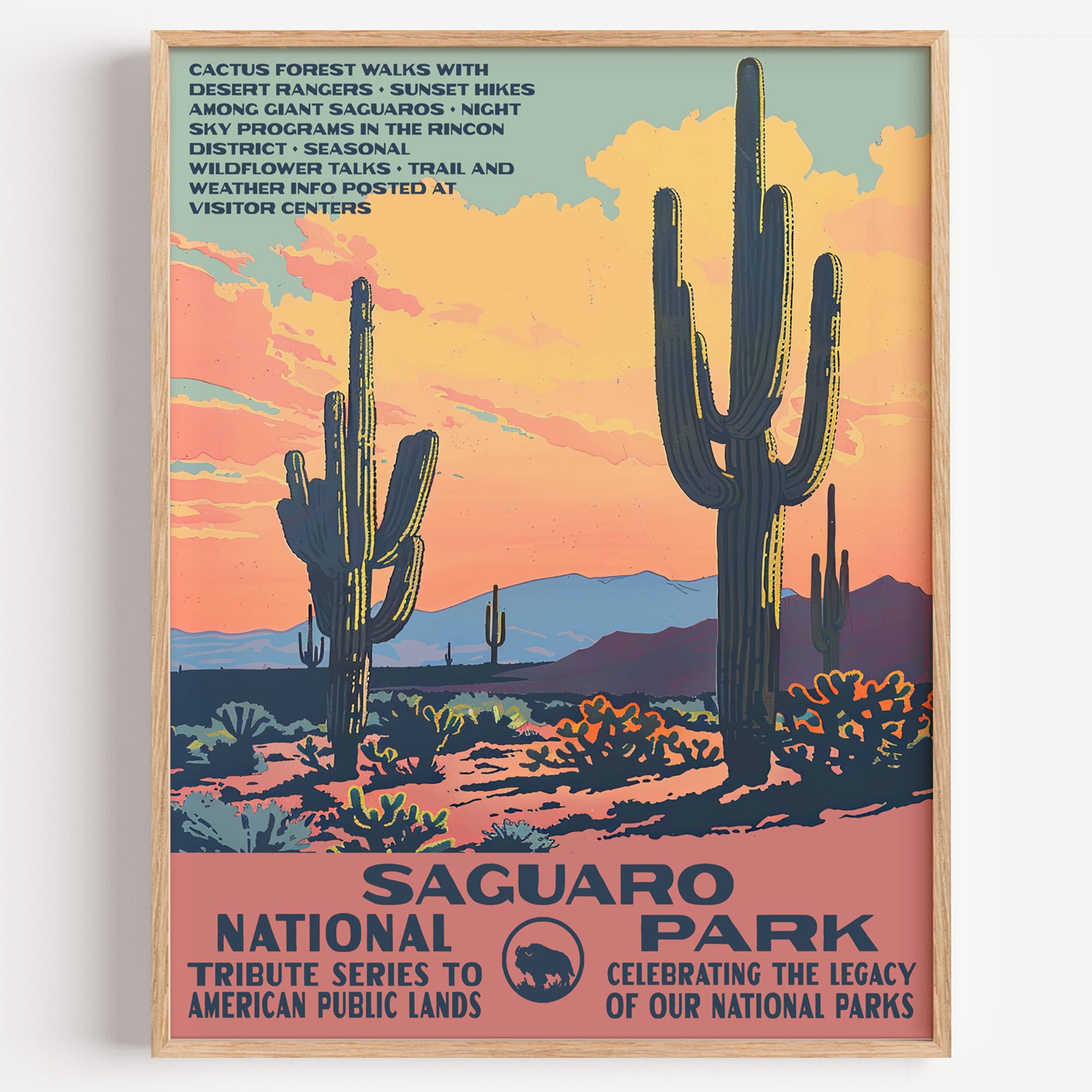 Saguaro National Park wall art print in a thin wood frame, saguaro cacti silhouetted against a pink desert sunset