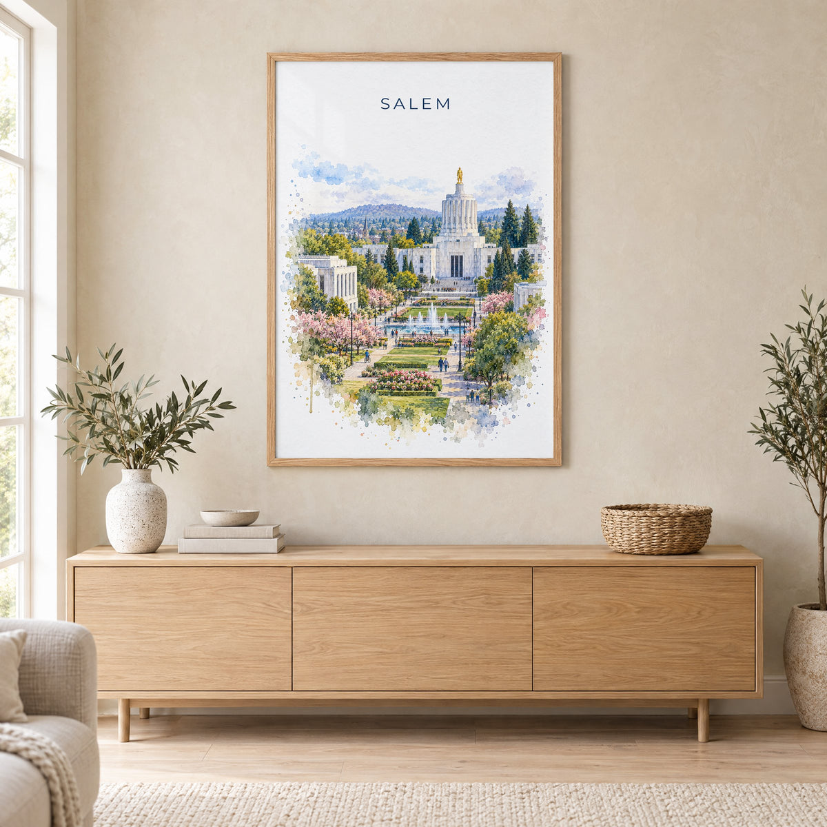Salem, Oregon watercolor print in an oak frame above a light wood sideboard in a Scandinavian living room