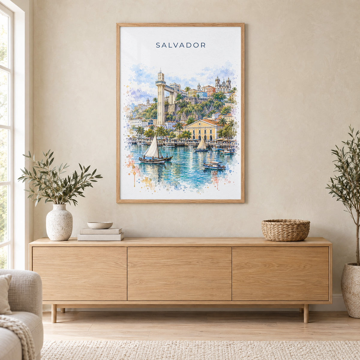 Salvador, Brazil watercolor print in an oak frame above a light wood sideboard in a Scandinavian living room