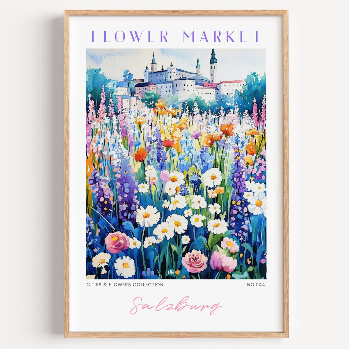 Salzburg flower market print in a light oak frame on a plain white wall
