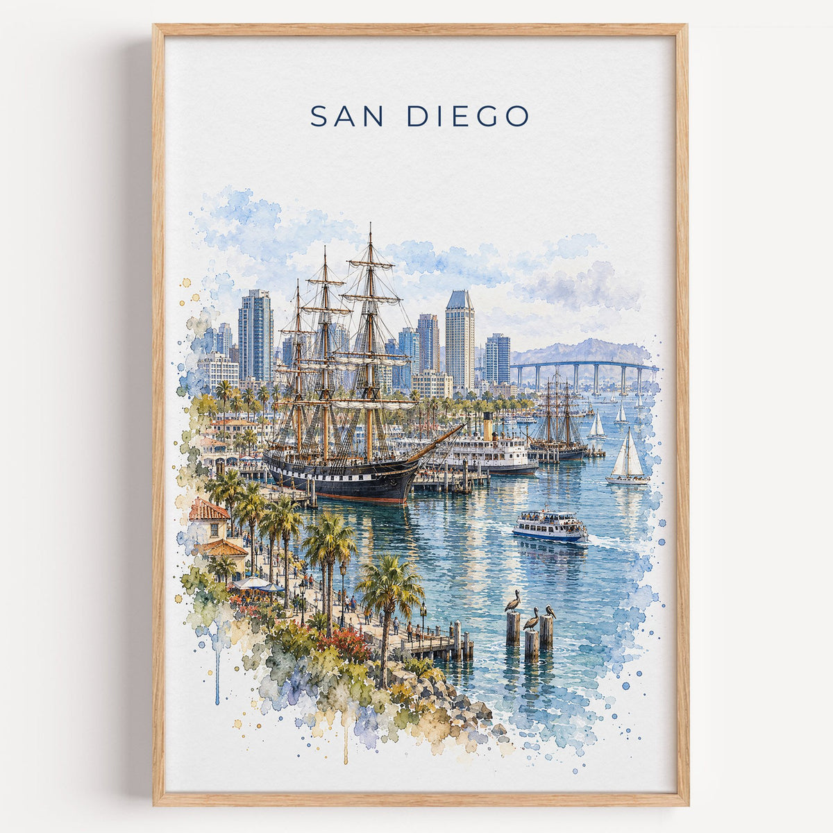 San Diego Bay watercolor print in a light oak frame on a plain white wall
