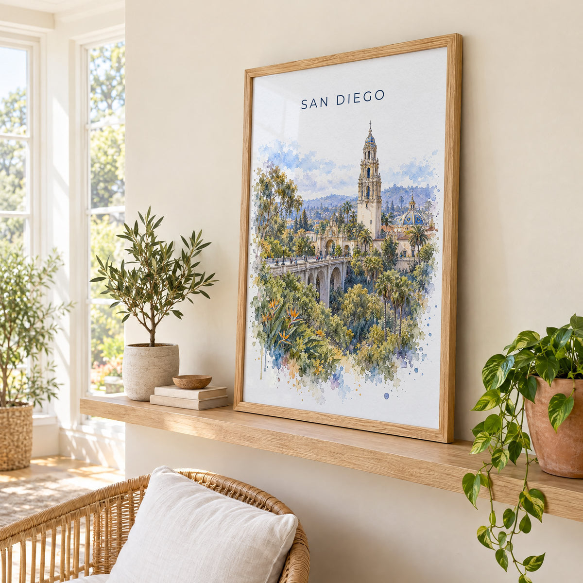 San Diego watercolor print in an oak frame on a picture ledge in a sunlit sunroom