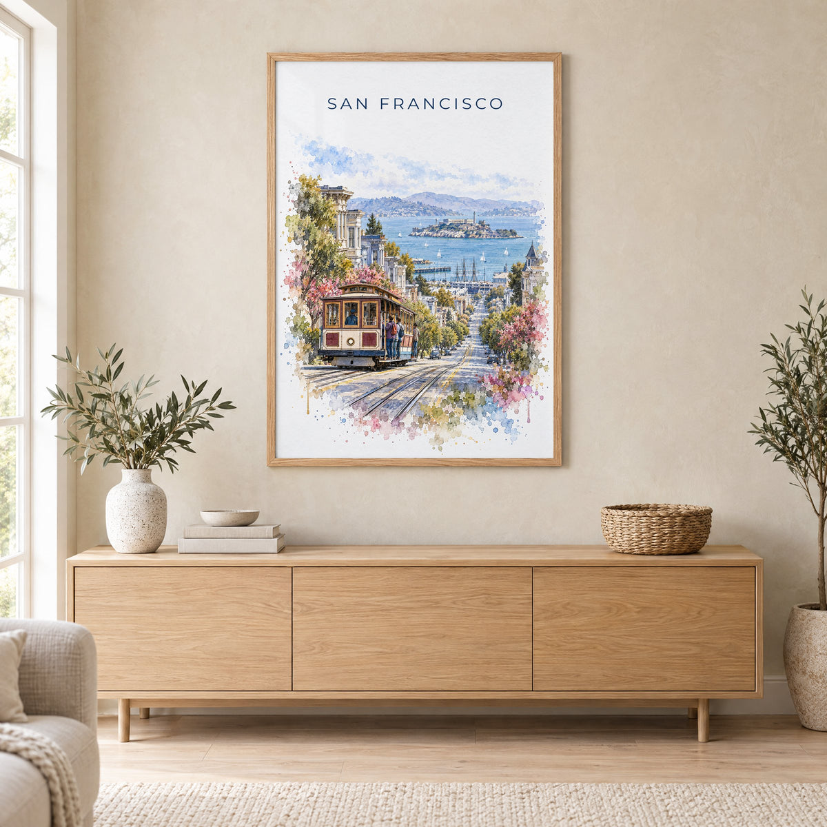 San Francisco Cable Car watercolor print in an oak frame above a light wood sideboard in a Scandinavian living room