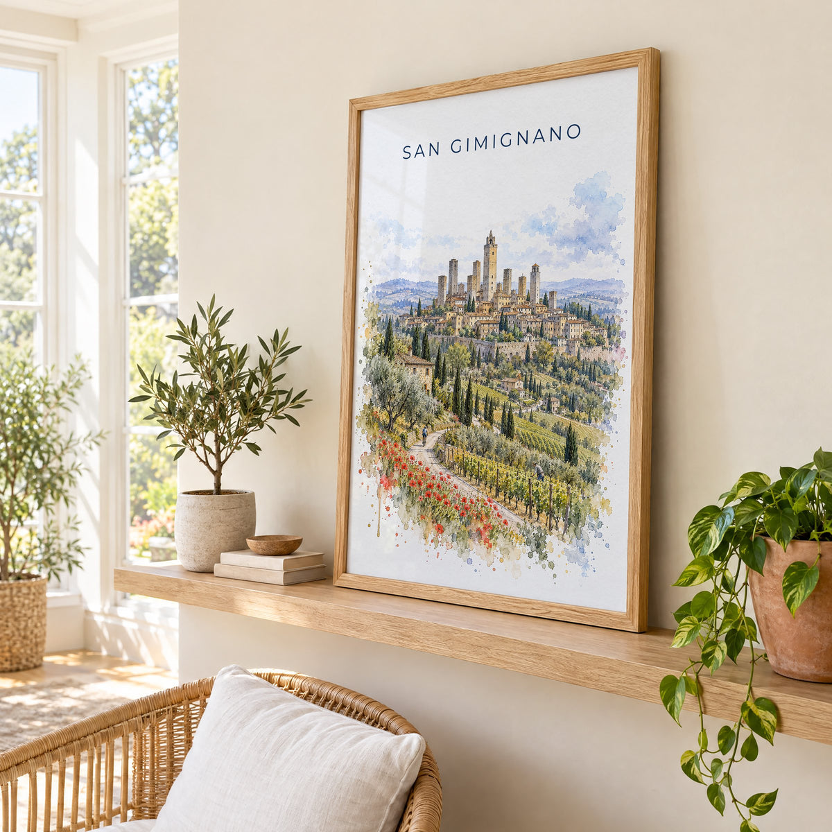 San Gimignano watercolor print in an oak frame on a picture ledge in a sunlit sunroom