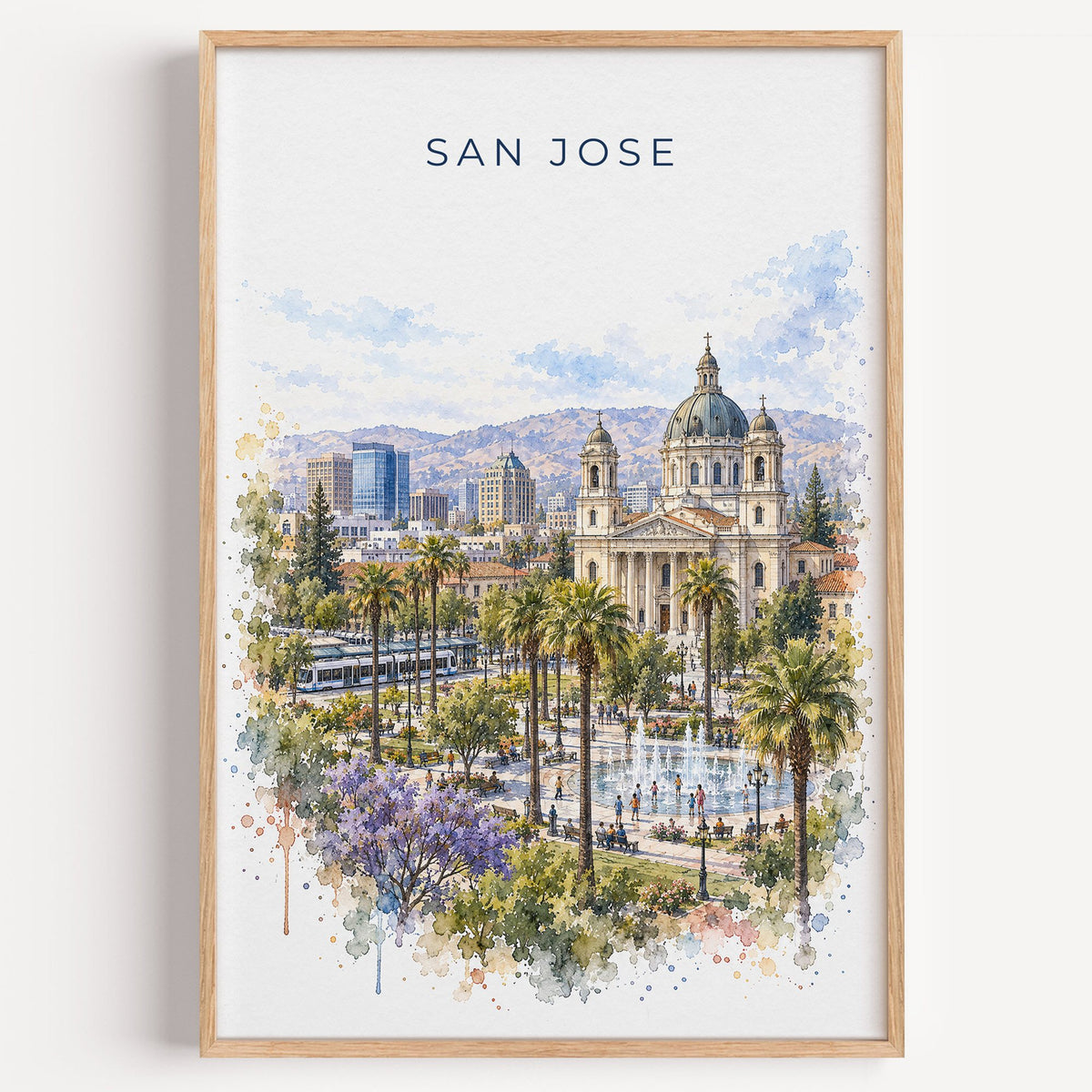 San Jose, California watercolor print in a light oak frame on a plain white wall