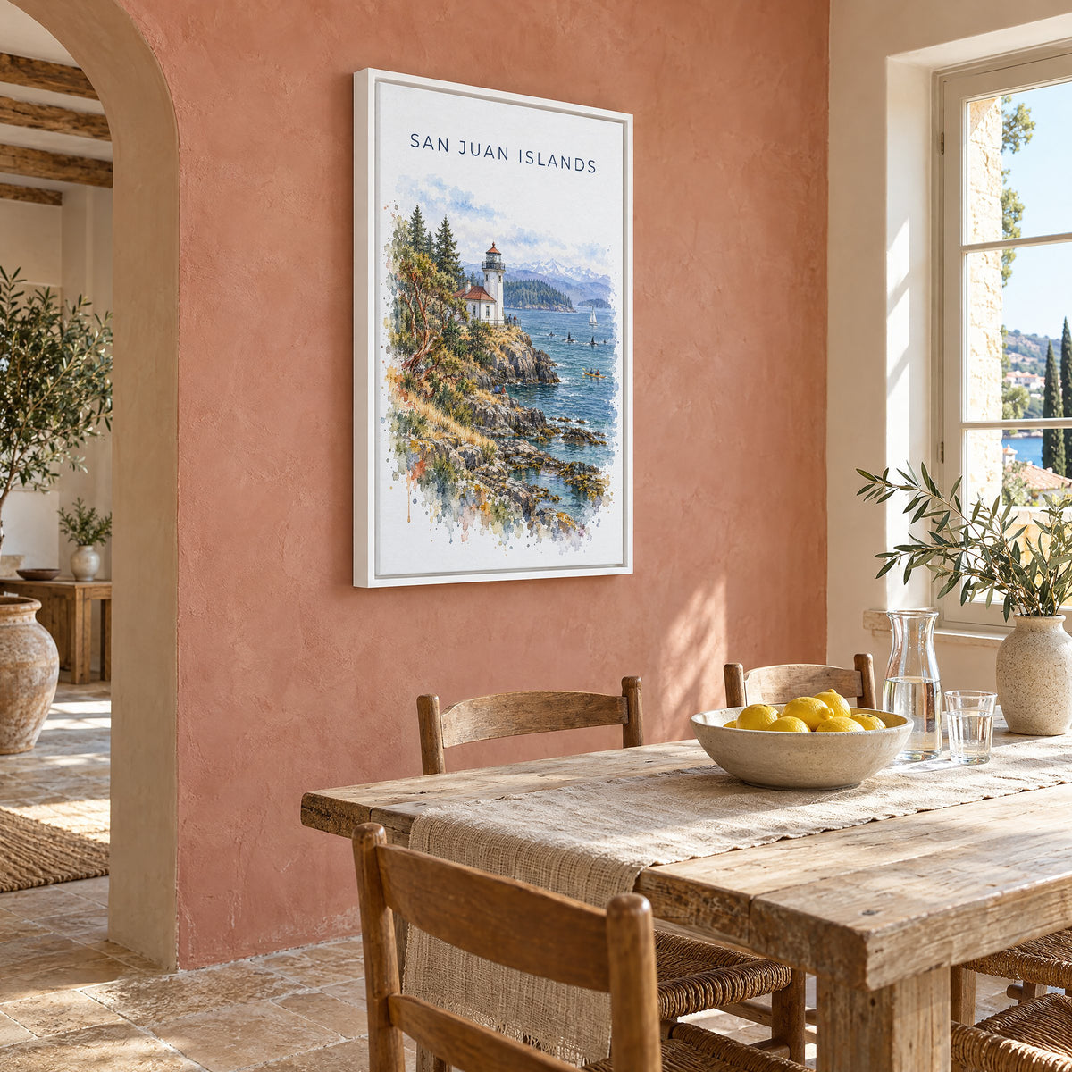 San Juan Islands watercolor print as a white floater canvas on a terracotta wall above a rustic dining table