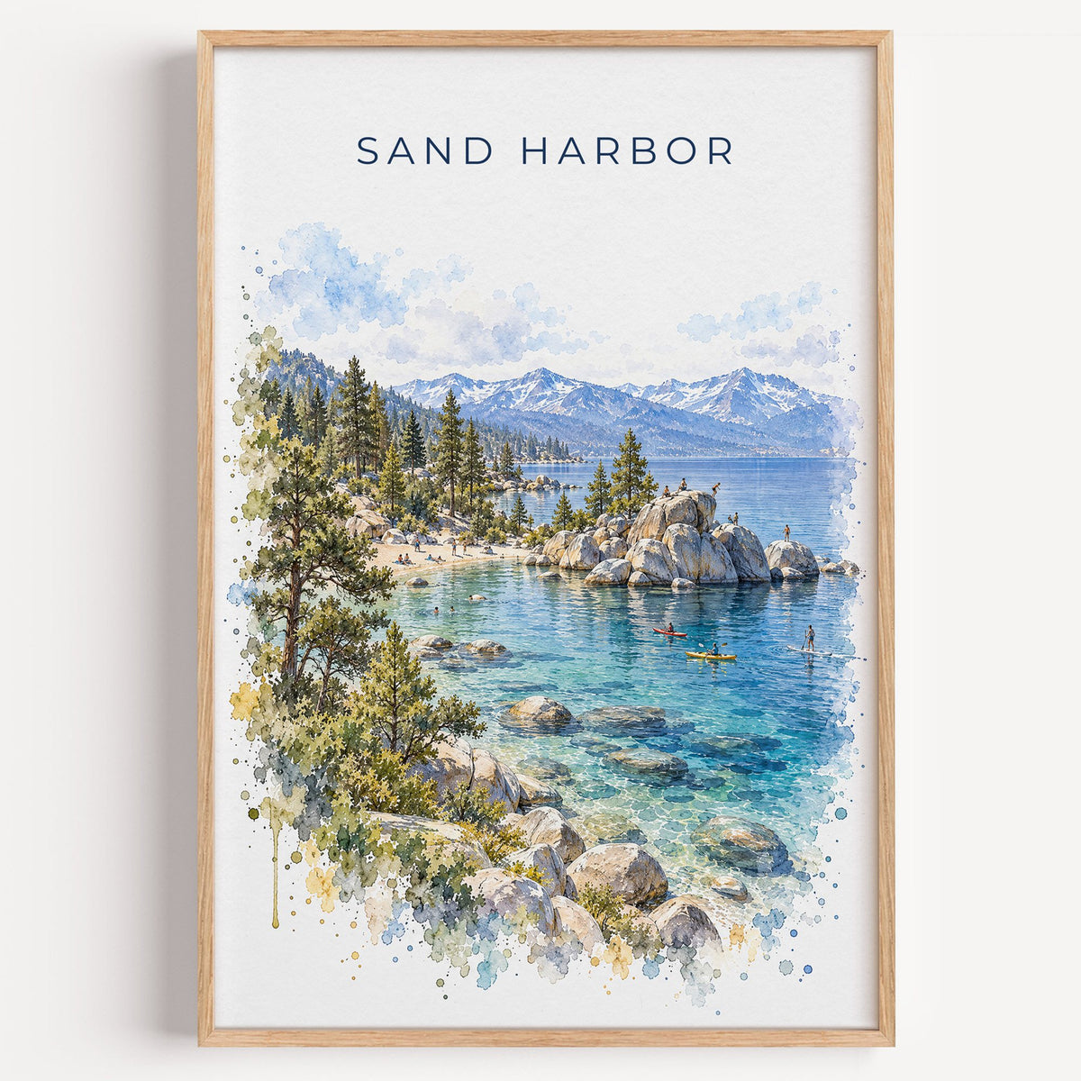 Sand Harbor watercolor print in a light oak frame on a plain white wall