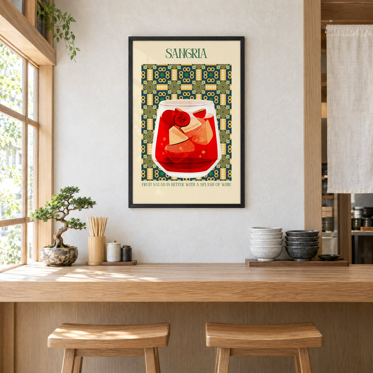 SANGRIA red glass patterned tile print in a black frame above a light wood ramen counter with stools and stacked bowls