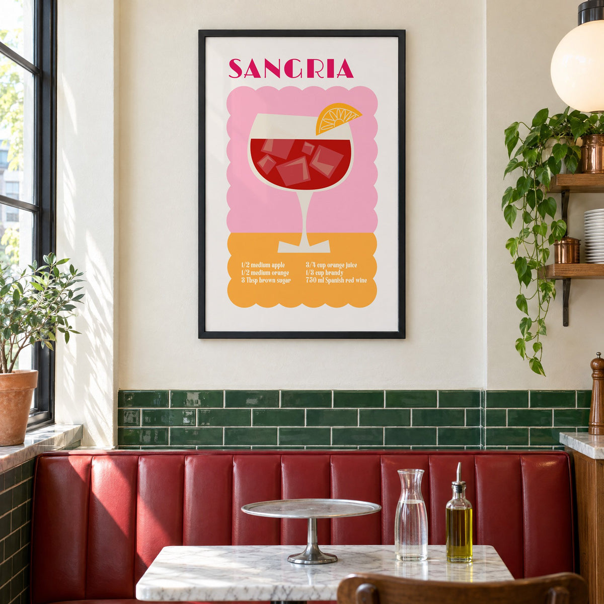 SANGRIA recipe pink and orange print in a black frame above a red leather booth in a sunny pizzeria