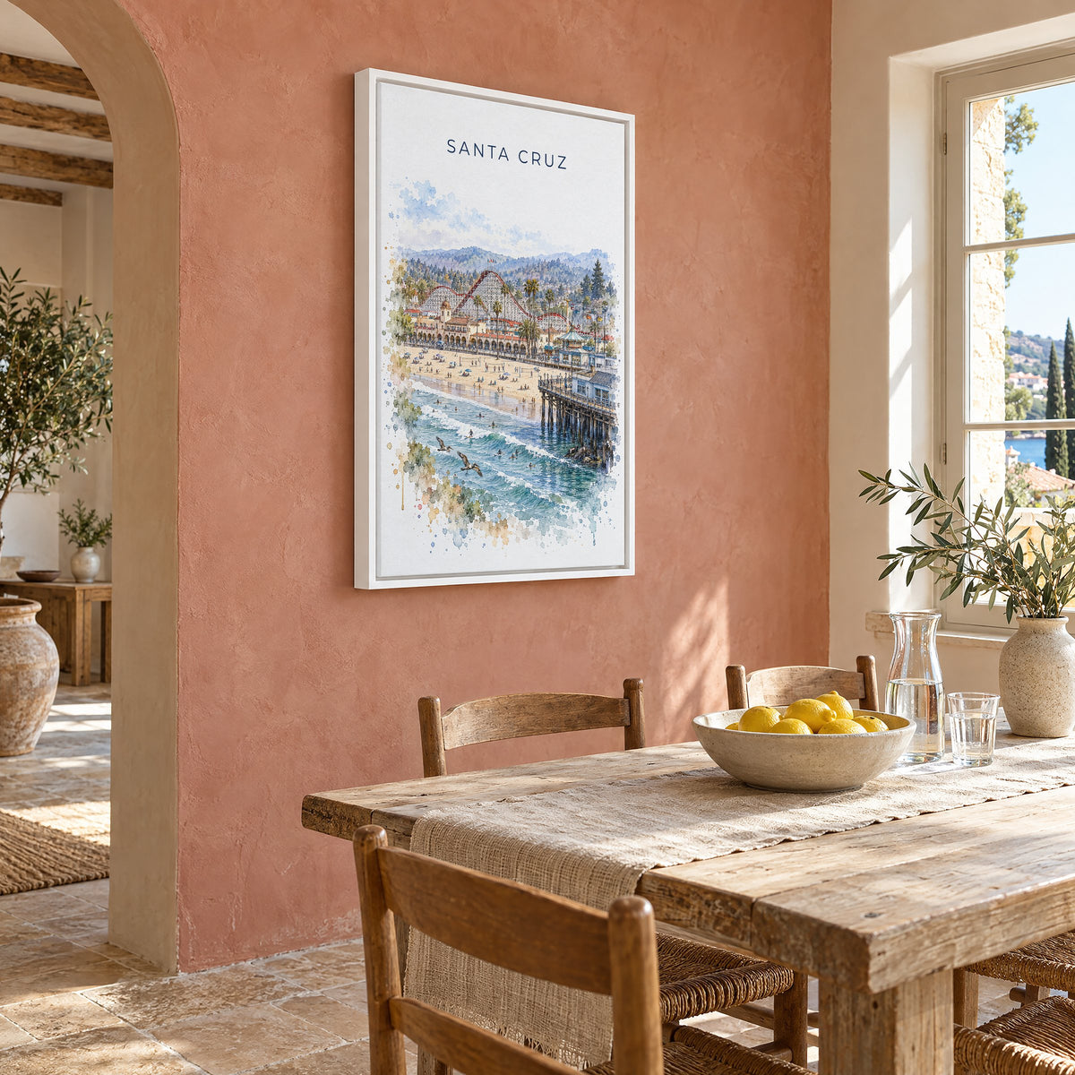 Santa Cruz, California watercolor print as a white floater canvas on a terracotta wall above a rustic dining table