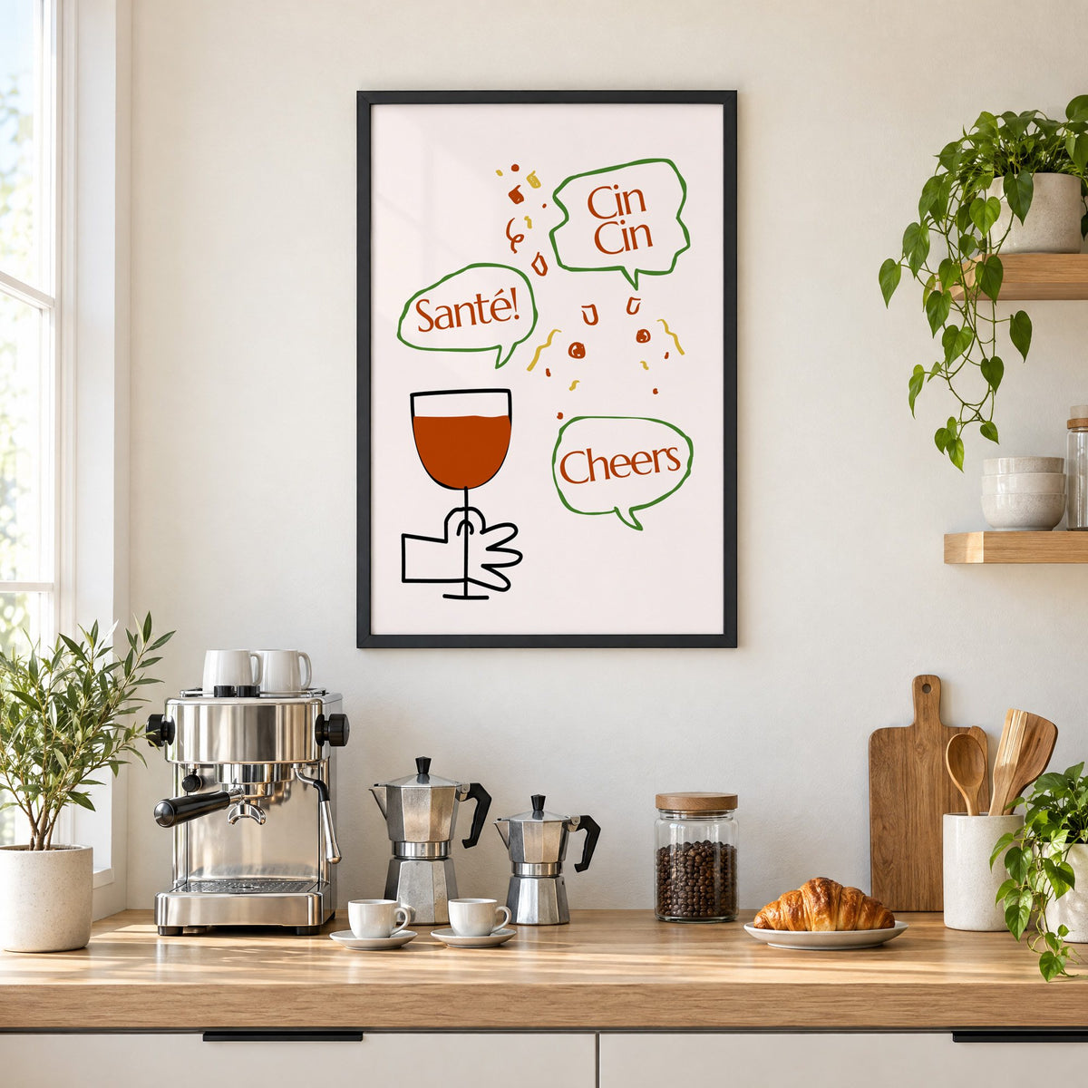 Cin Cin Santé Cheers speech bubbles wine print in a black frame above a home espresso bar with moka pots and espresso cups