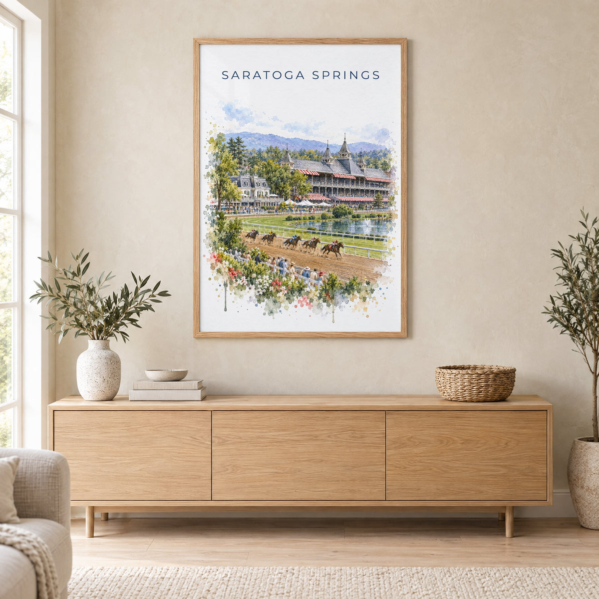 Saratoga Springs watercolor print in an oak frame above a light wood sideboard in a Scandinavian living room