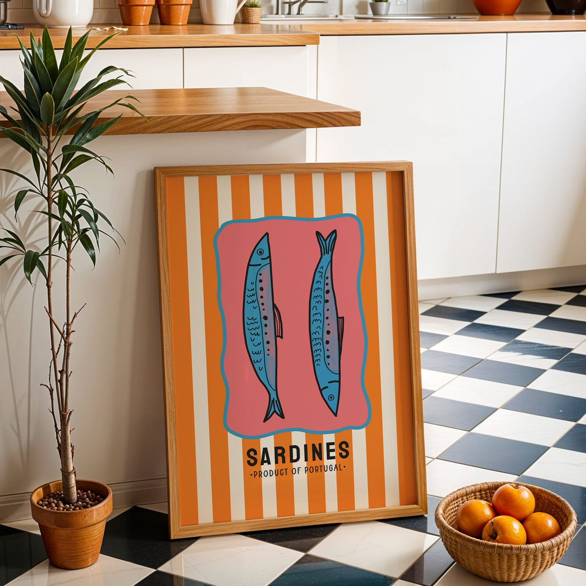 Sardines of Portugal print in an oak frame by a kitchen island and checkered floor