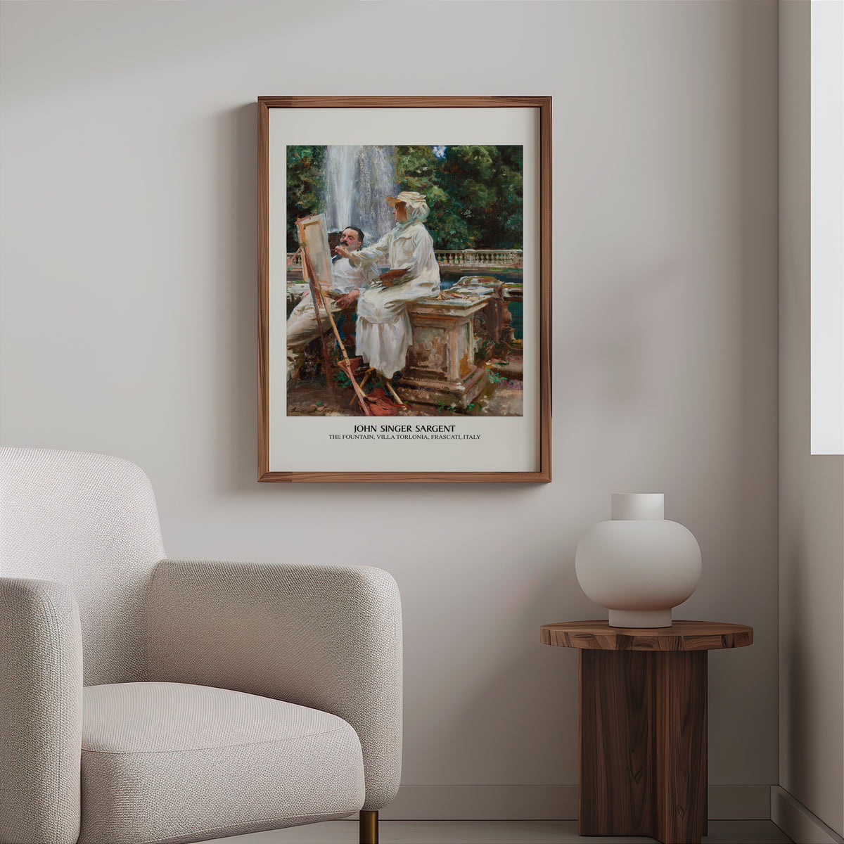Italian garden painting print in a slim walnut frame above a bouclé armchair