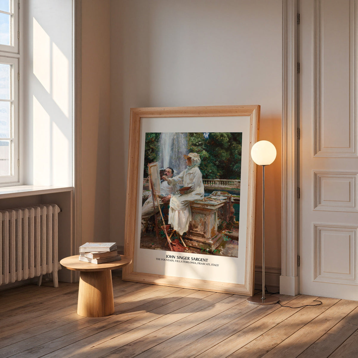 Villa Torlonia print in a wide pine frame leaning by a sunlit window