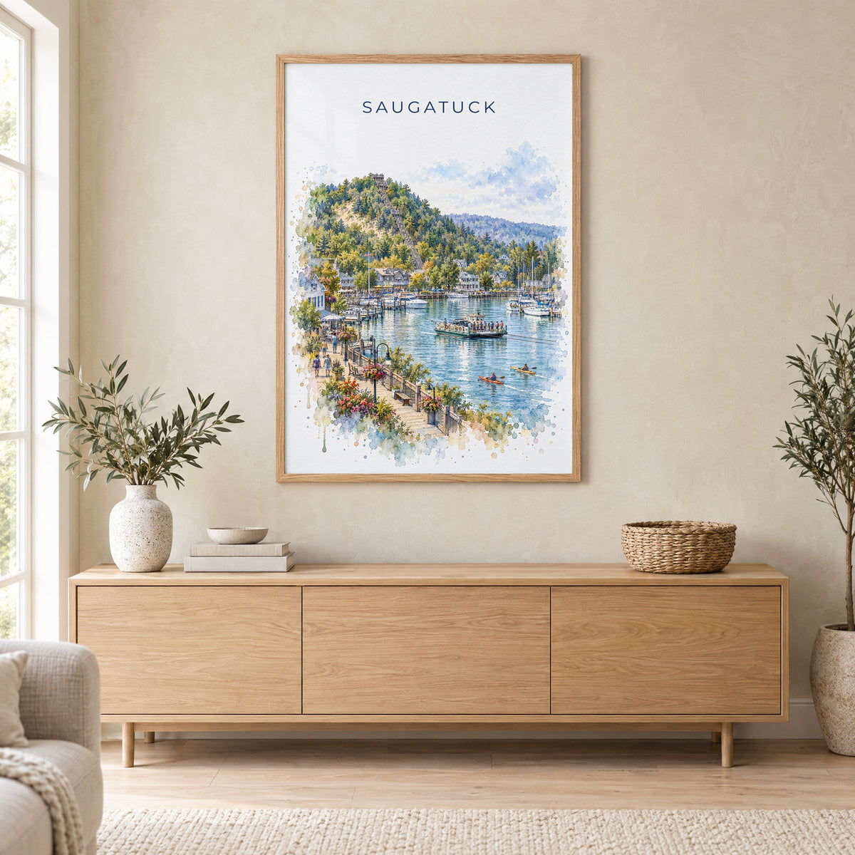 Saugatuck watercolor print in an oak frame above a light wood sideboard in a Scandinavian living room