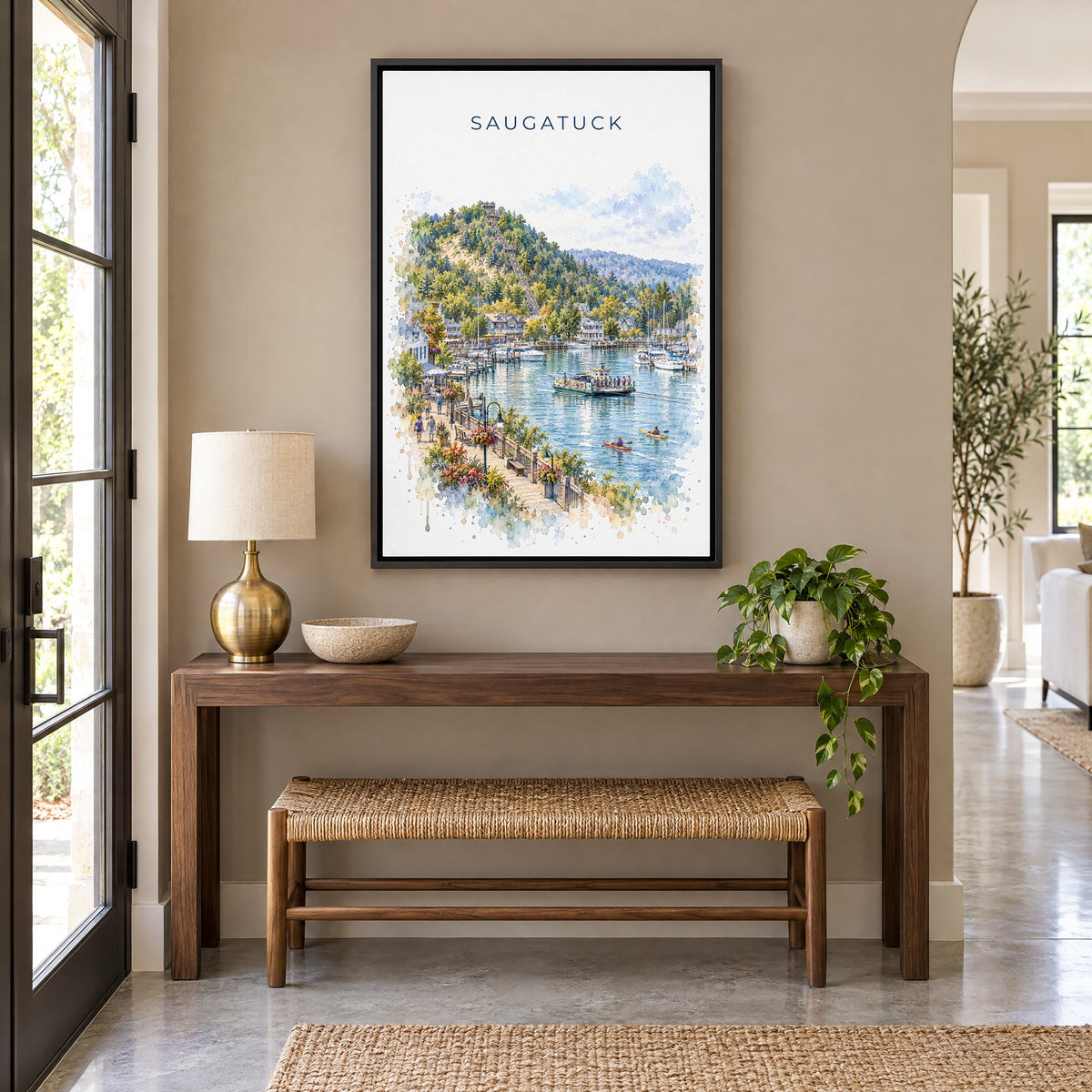 Saugatuck watercolor print as a black floater canvas above a walnut console and woven bench in an entryway