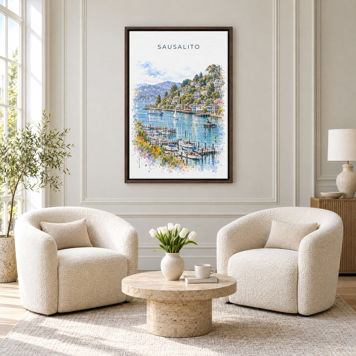 Sausalito watercolor print as an espresso floater canvas above two boucle armchairs in a hotel lounge