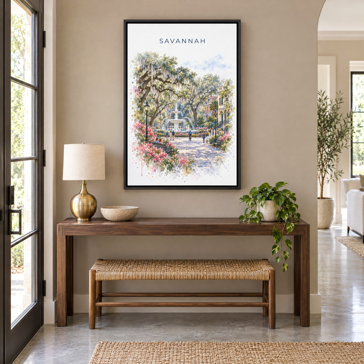 Savannah watercolor print as a black floater canvas above a walnut console and woven bench in an entryway