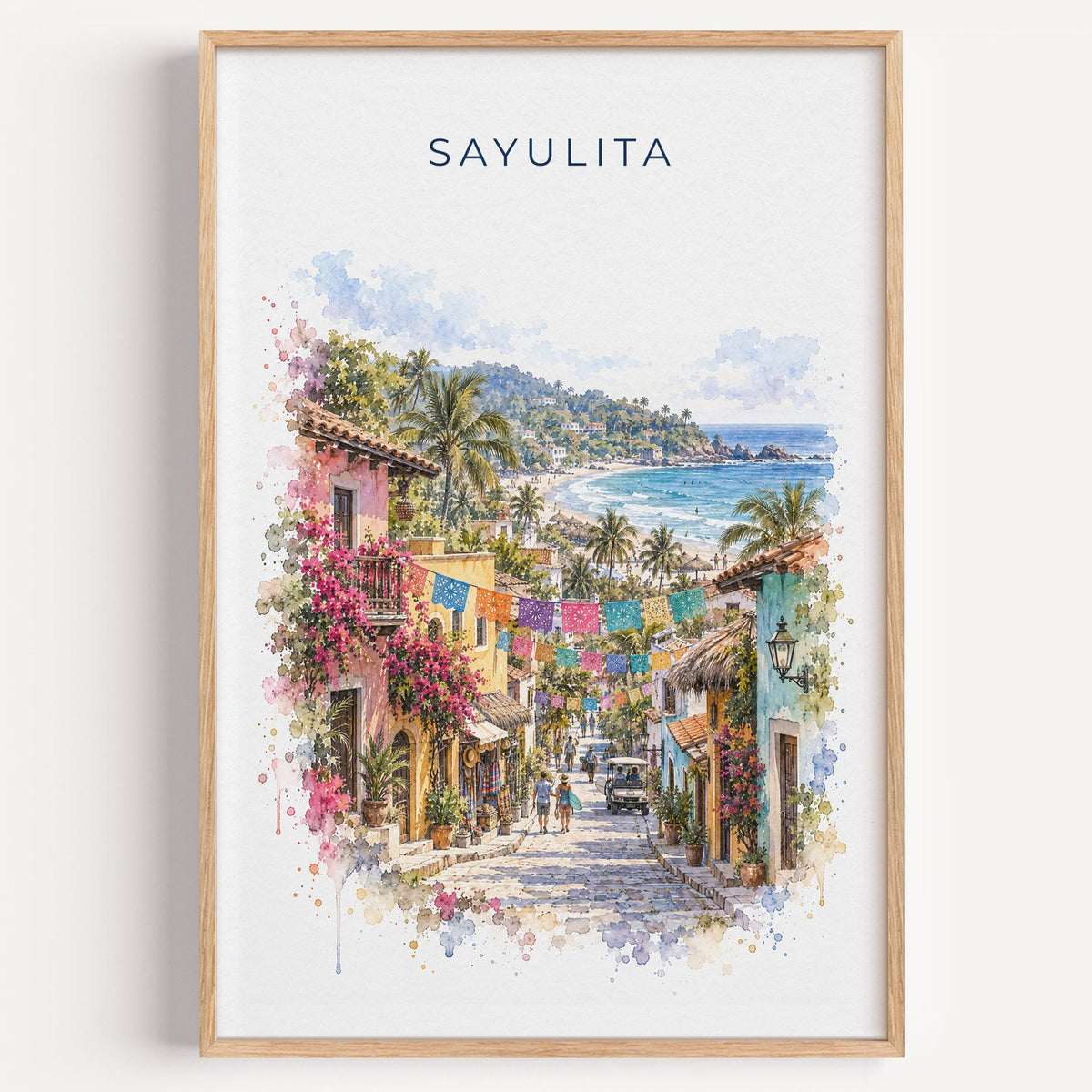 Sayulita watercolor print in a light oak frame on a plain white wall
