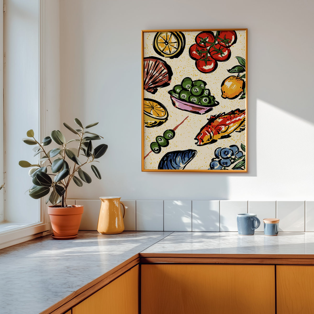 Seafood citrus pattern print shown in a gold frame above a marble counter with a yellow ceramic jug