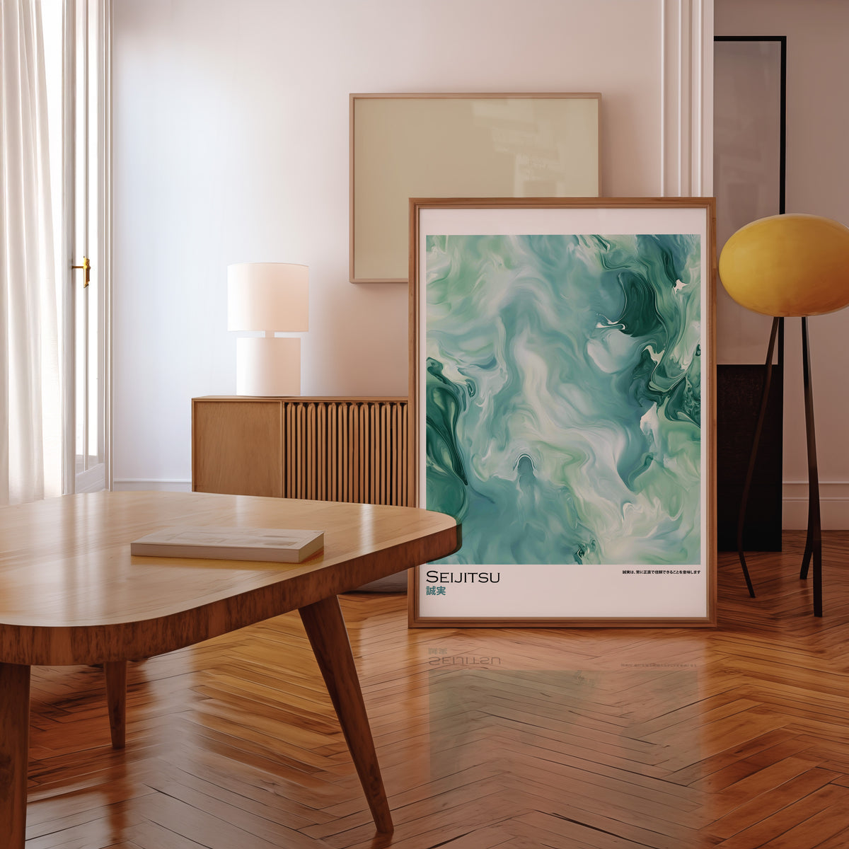Teal and moss green marble print in a walnut frame leaning in a mid-century living room