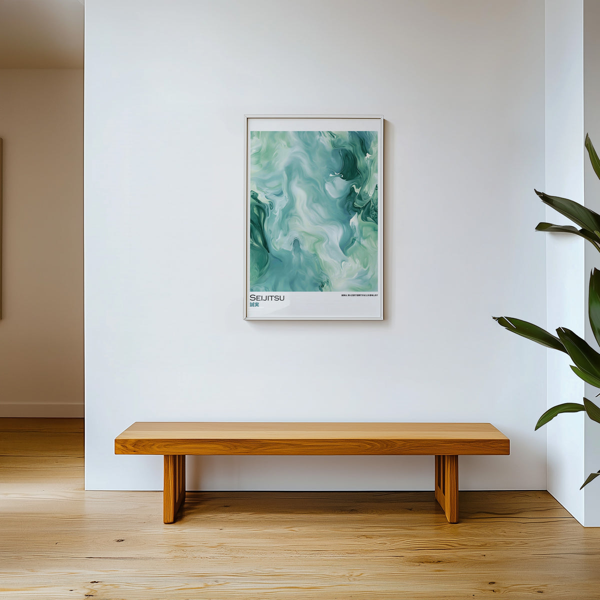 Teal and moss green marble print shown in a white frame above a wooden entryway bench