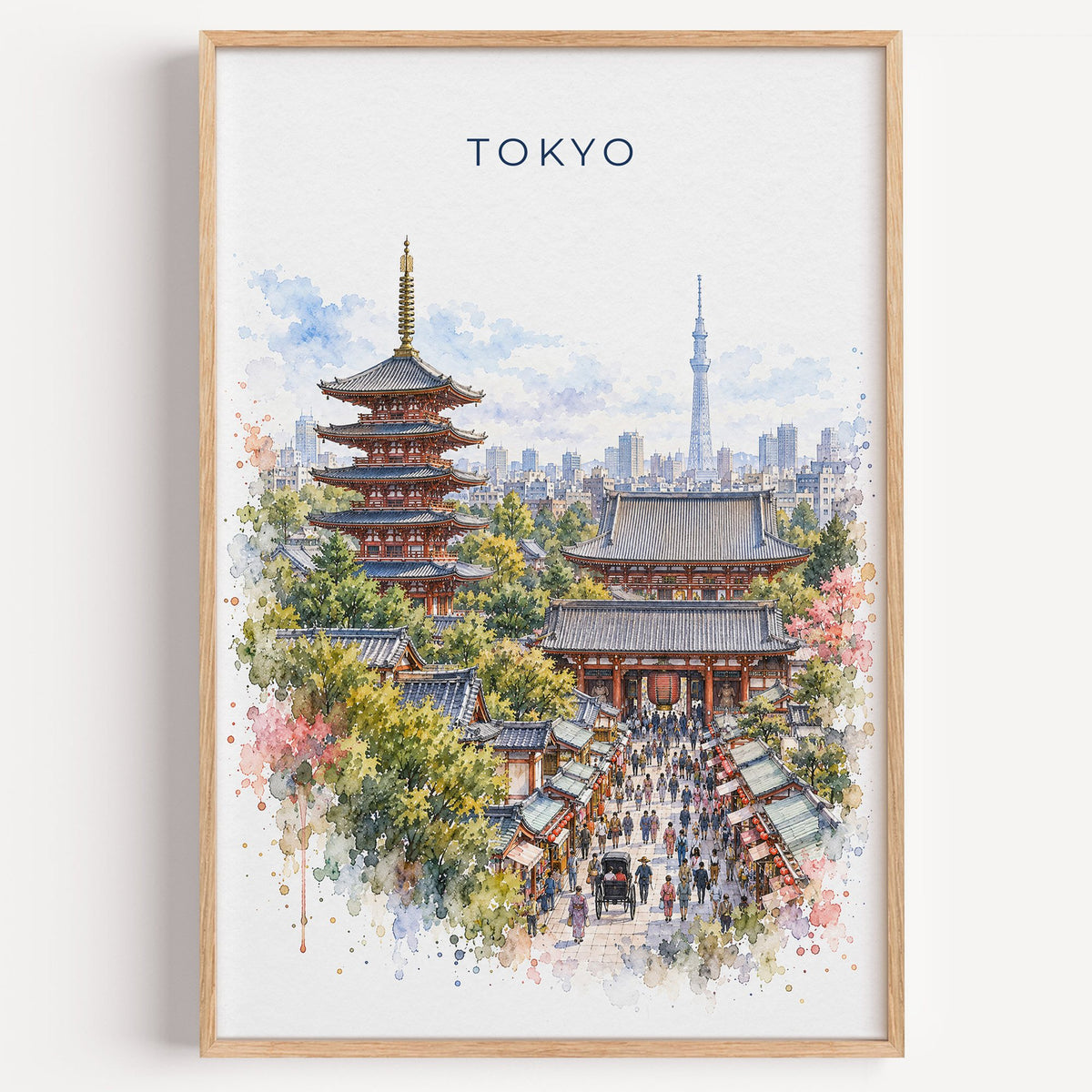 Senso-ji watercolor print in a light oak frame on a plain white wall