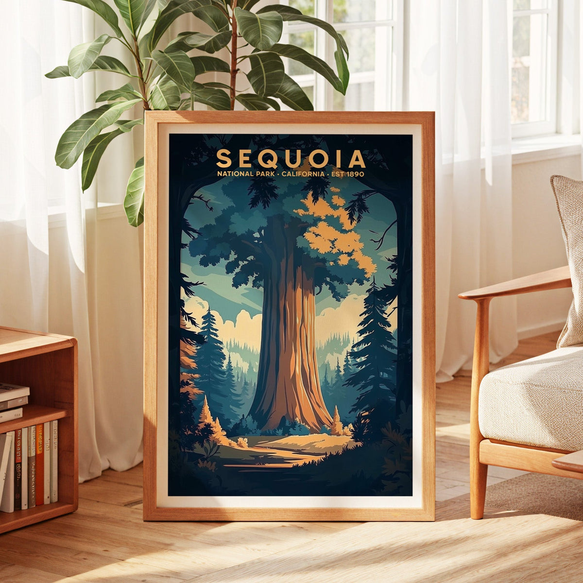 Sequoia National Park print in an oak frame by a sunlit window with sheer curtains and a fig plant
