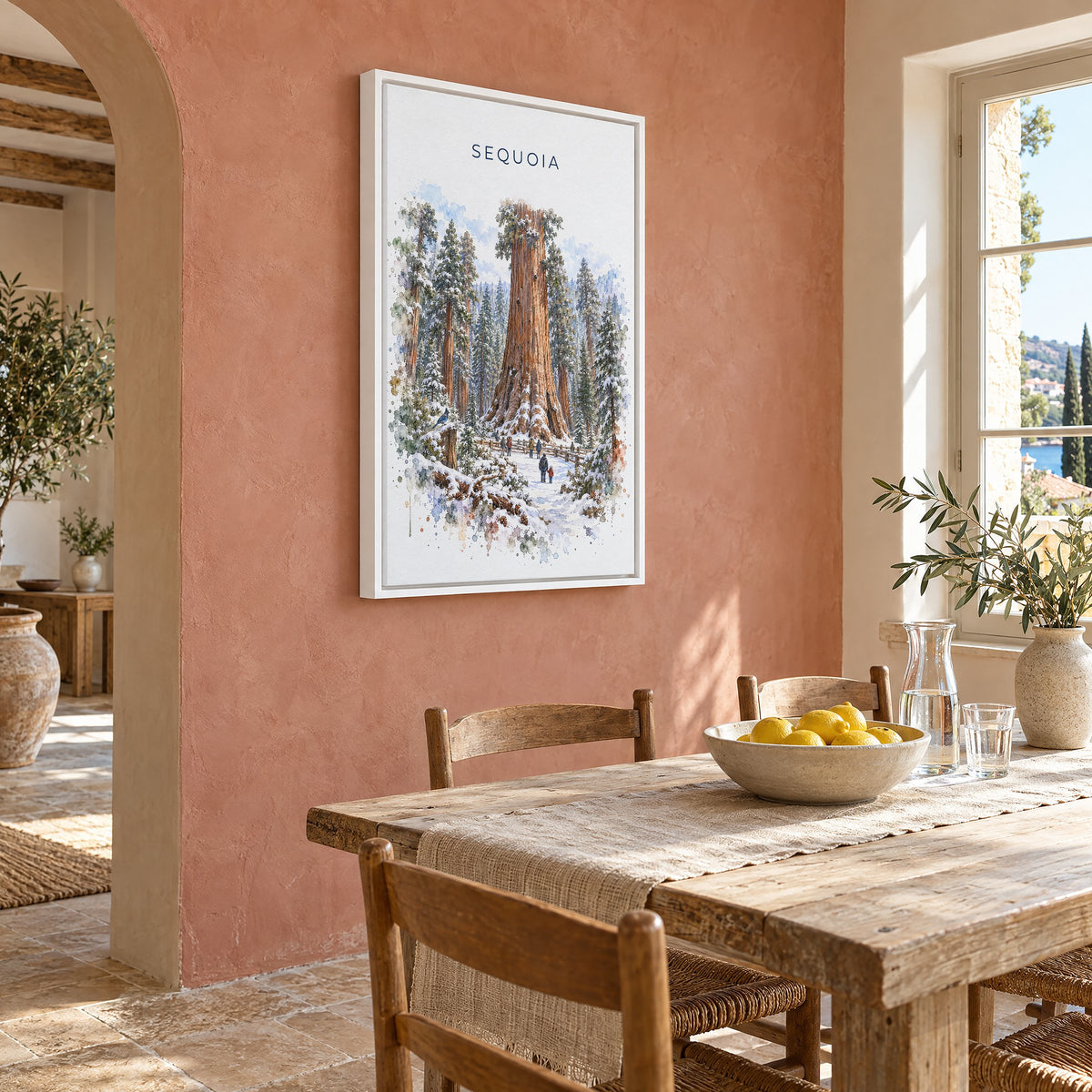 Sequoia National Park watercolor print as a white floater canvas on a terracotta wall above a rustic dining table