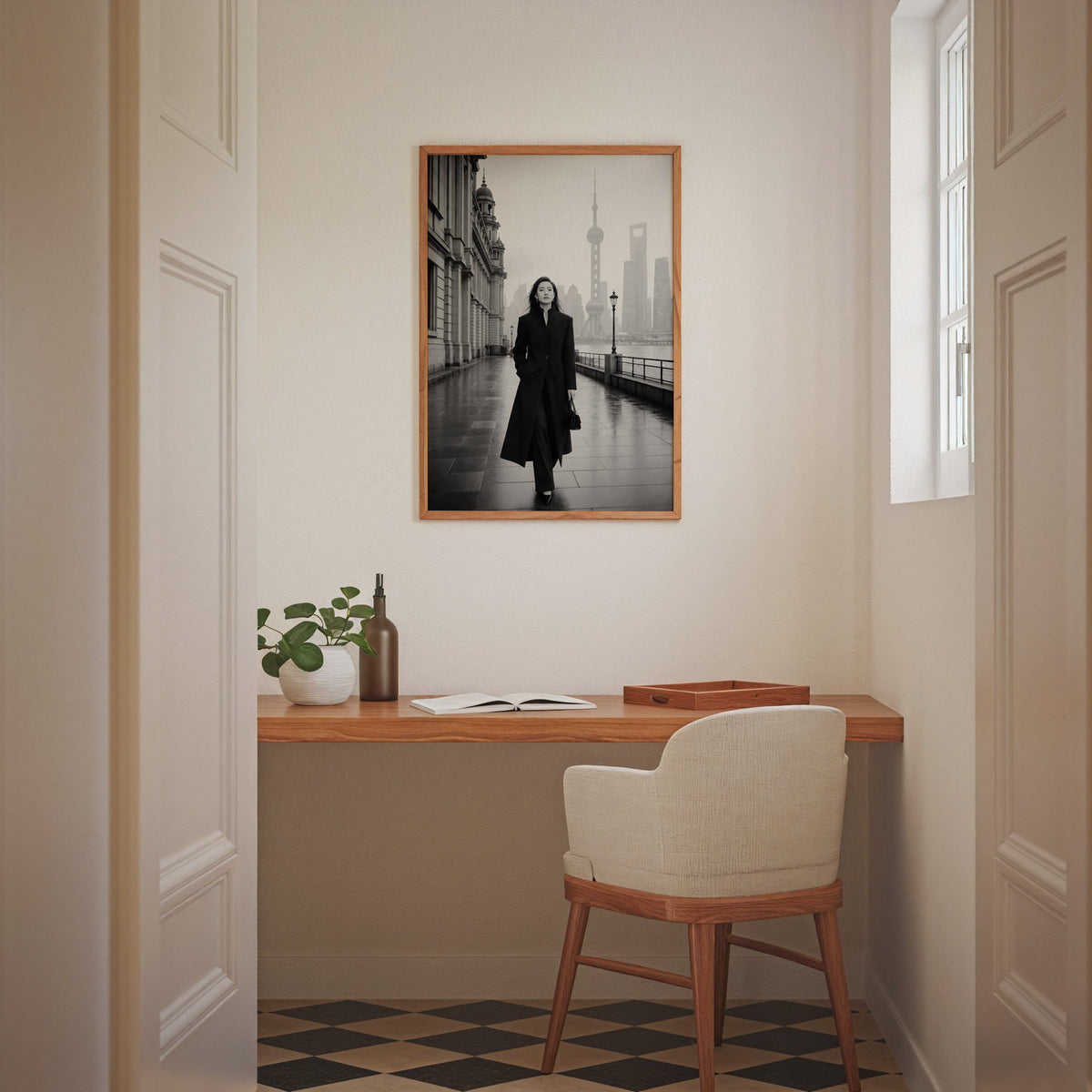 Black and white Shanghai Bund woman in black coat print in an oak frame above a home office desk nook