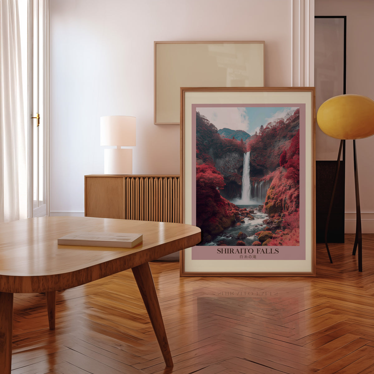 Shiraito Falls in autumn print in a walnut frame leaning in a mid-century living room