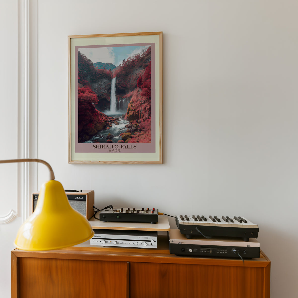 Shiraito Falls in autumn print in an oak frame above a teak sideboard with vintage hi-fi