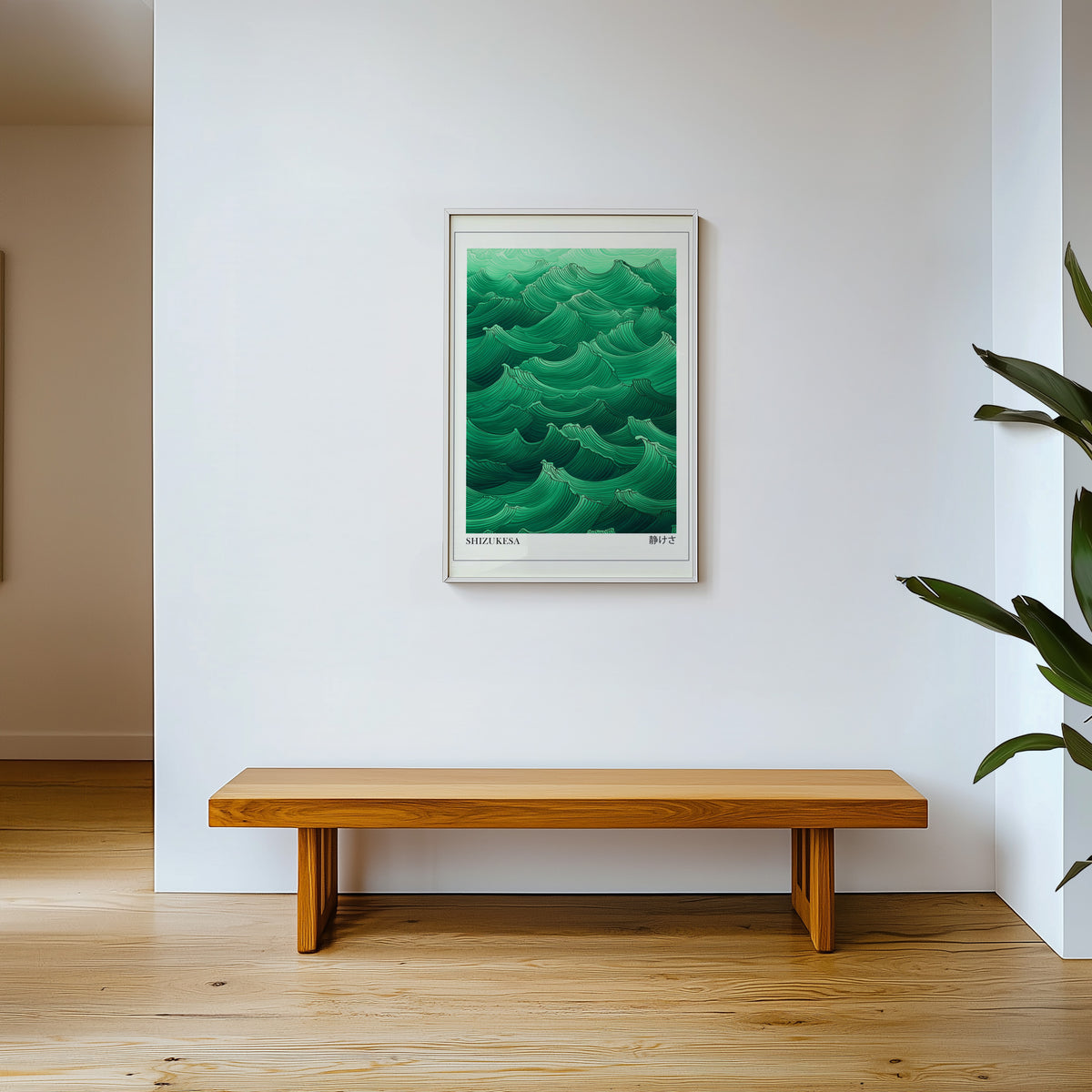 Jade green Shizukesa waves print shown in a white frame above a wooden entryway bench