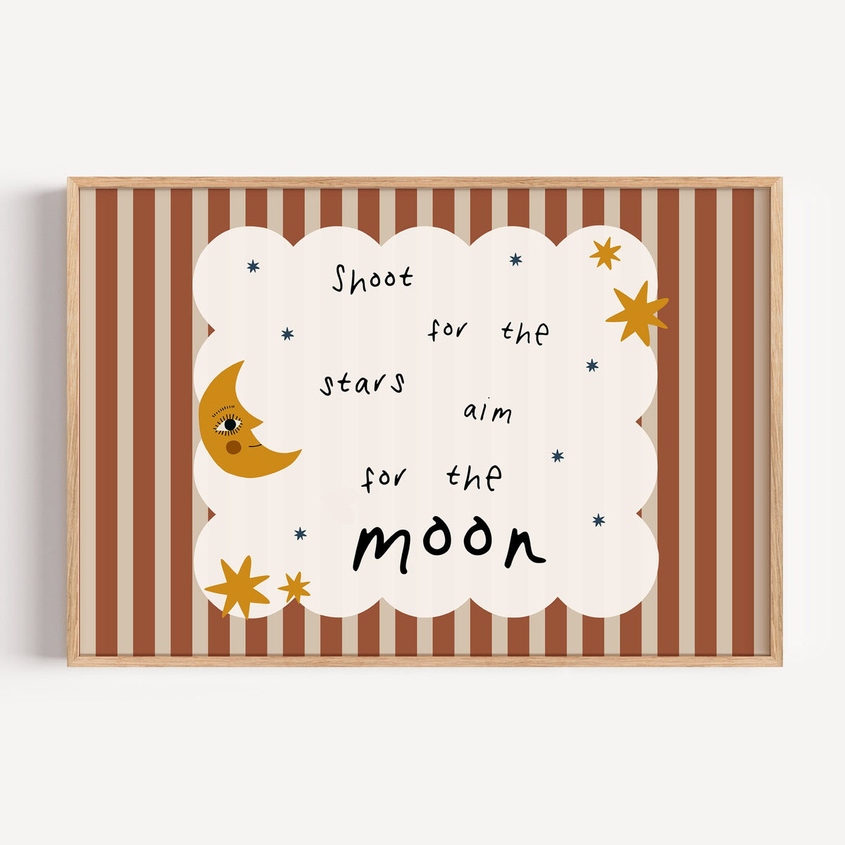 Landscape shoot for the stars moon nursery print in a light oak frame on a plain white wall
