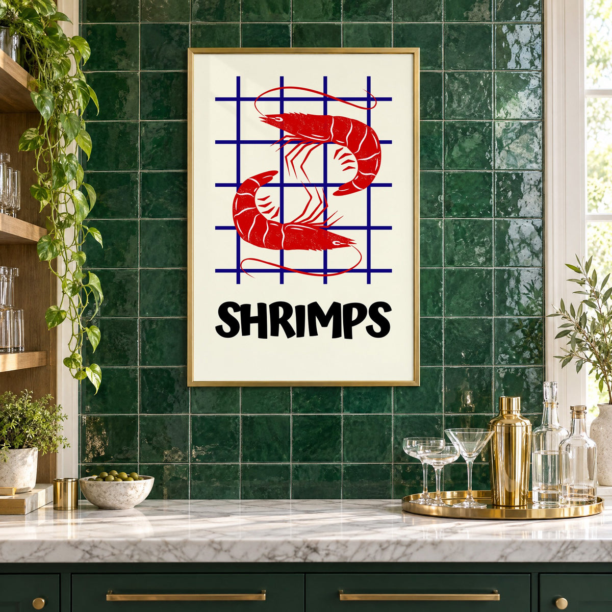 SHRIMPS red and blue grid print in a brass frame on emerald green tiles above a home bar with coupe glasses