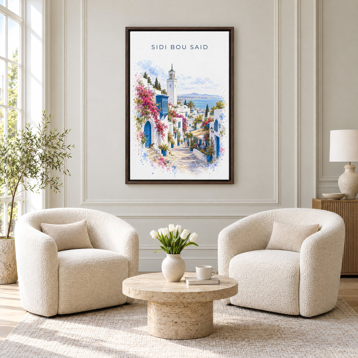 Sidi Bou Said watercolor print as an espresso floater canvas above two boucle armchairs in a hotel lounge