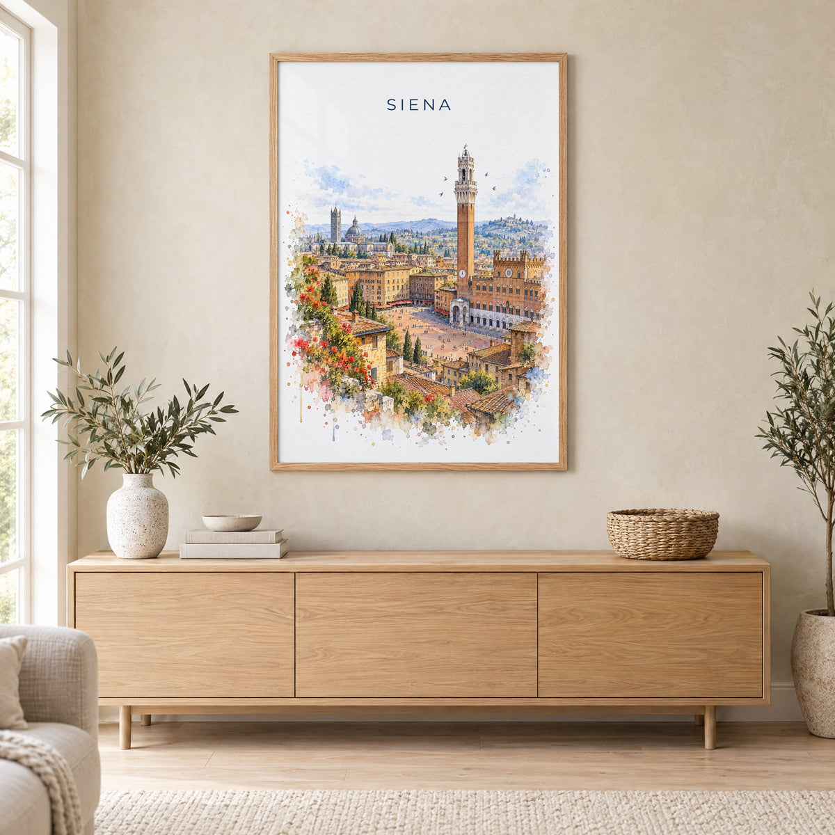 Siena watercolor print in an oak frame above a light wood sideboard in a Scandinavian living room