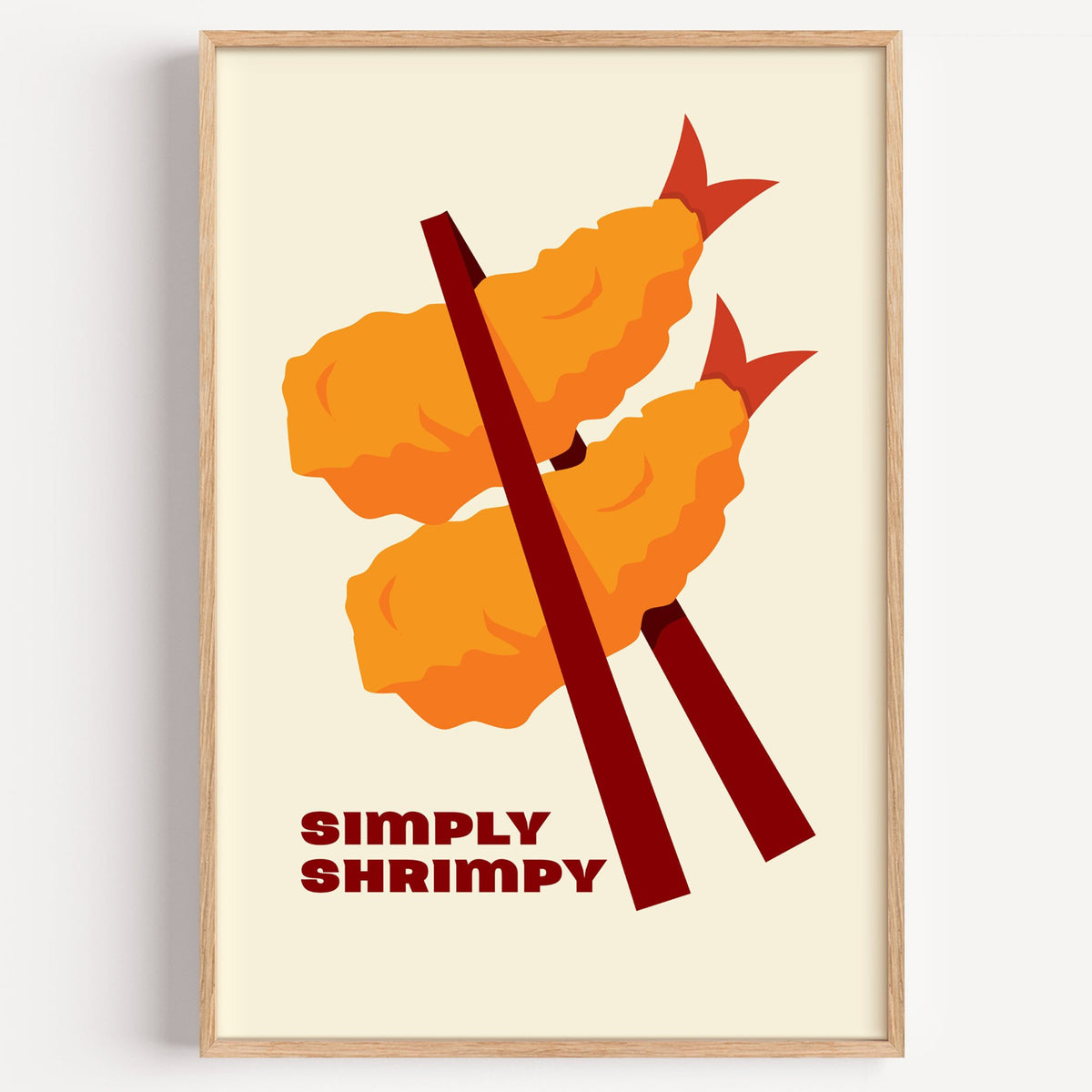 SIMPLY SHRIMPY tempura shrimp chopsticks print in a light oak frame on a plain white wall